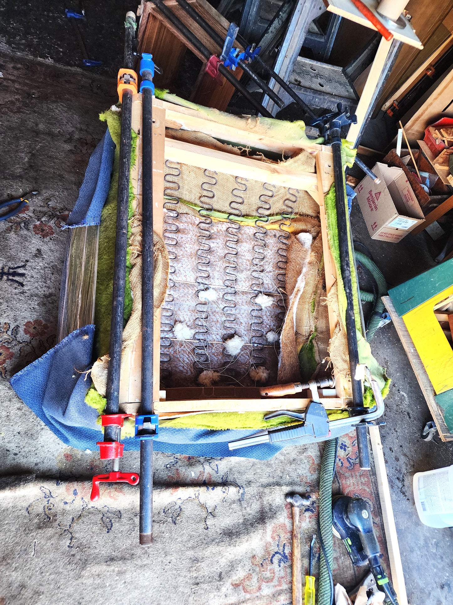 Mid Century Modern armchair with green faux fur upholstery