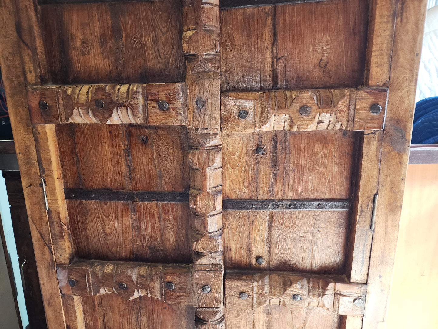 Indian 19th Century Gujarat Teak Armoire with Iron Braces and Carved Columns
