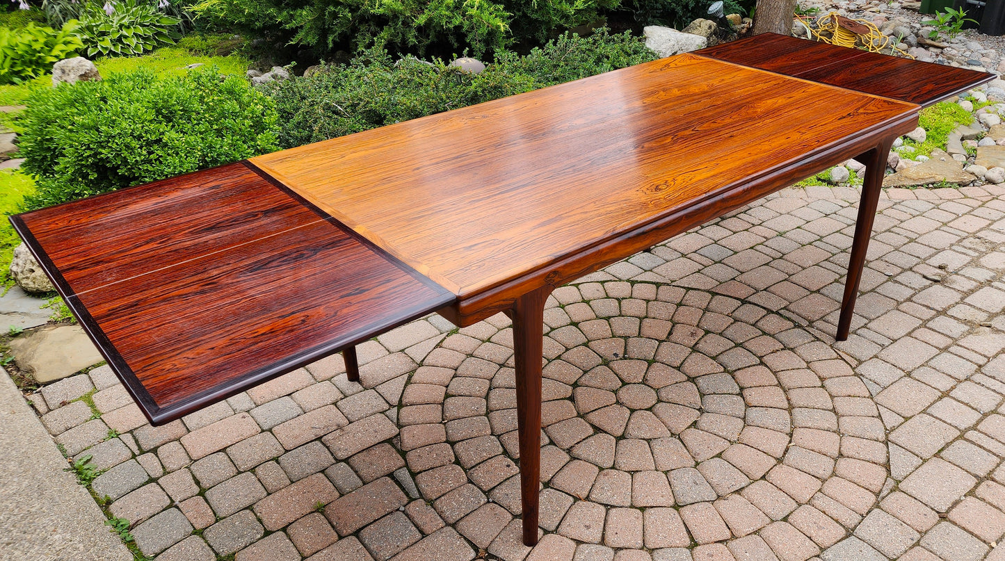 Danish MCN draw leaf rosewood table by Johannes Andersen 63"-102" & 6 Lis chairs by Niels Kofoed