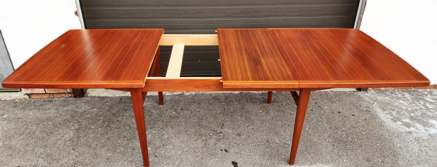 REFINISHED Mid Century Modern Teak Table w 2 Leaves Self-Storing 65.5"-101.5"