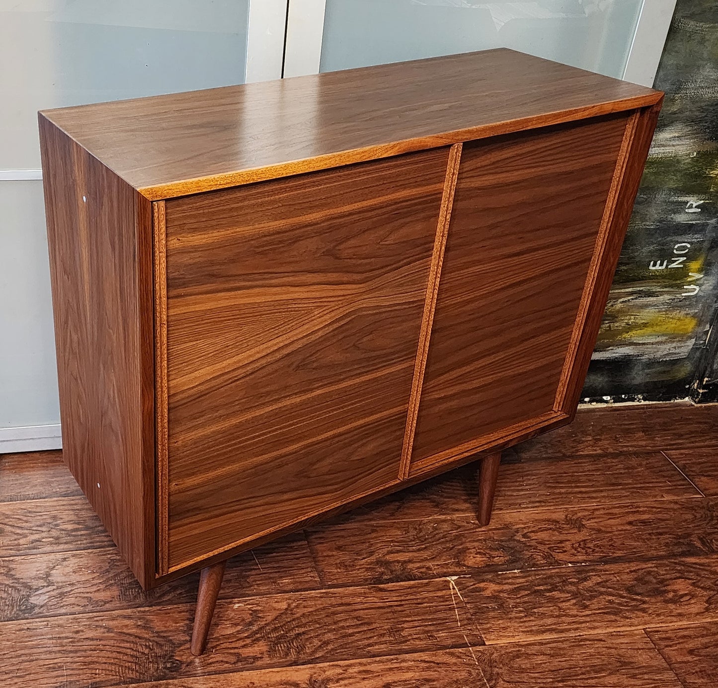 REFINISHED MCM walnut cabinet w sliding doors, narrow, fits records 37.5”