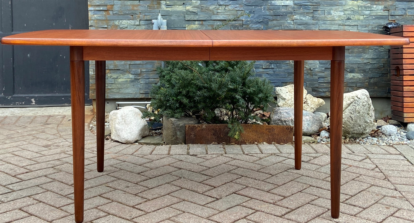 REFINISHED MCM Boat Shaped Teak Table Self storing w 2 Leaves by G. Bahus 63"-96"