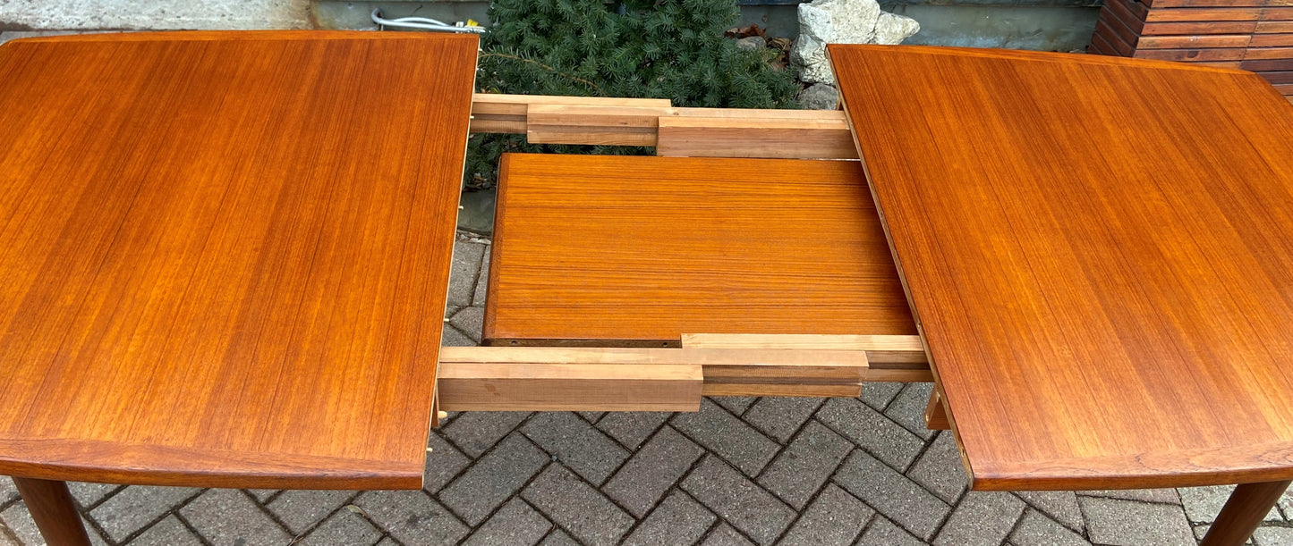 REFINISHED MCM Boat Shaped Teak Table Self storing w 2 Leaves by G. Bahus 63"-96"