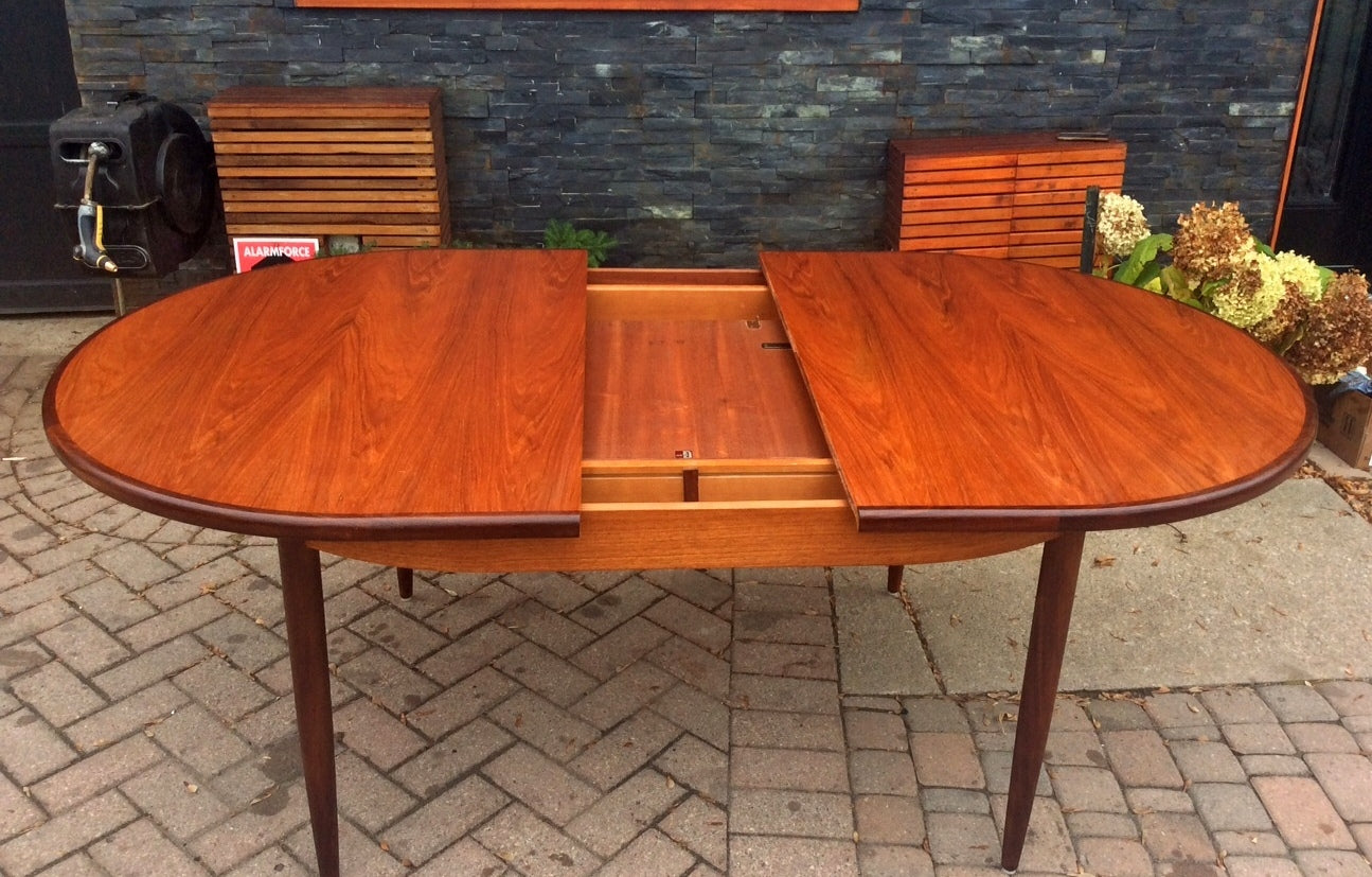 REFINISHED Mid Century Modern Oval Teak Dining Table Extendable Self Storing with butterfly leaf by GPlan - Mid Century Modern Toronto