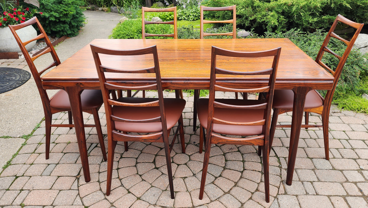 Danish MCN draw leaf rosewood table by Johannes Andersen 63"-102" & 6 Lis chairs by Niels Kofoed