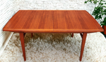 REFINISHED Mid Century Modern Teak Table w 2 Leaves Self-Storing 65.5