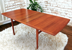 REFINISHED Mid Century Modern Teak Table w 2 Leaves Self-Storing 65.5