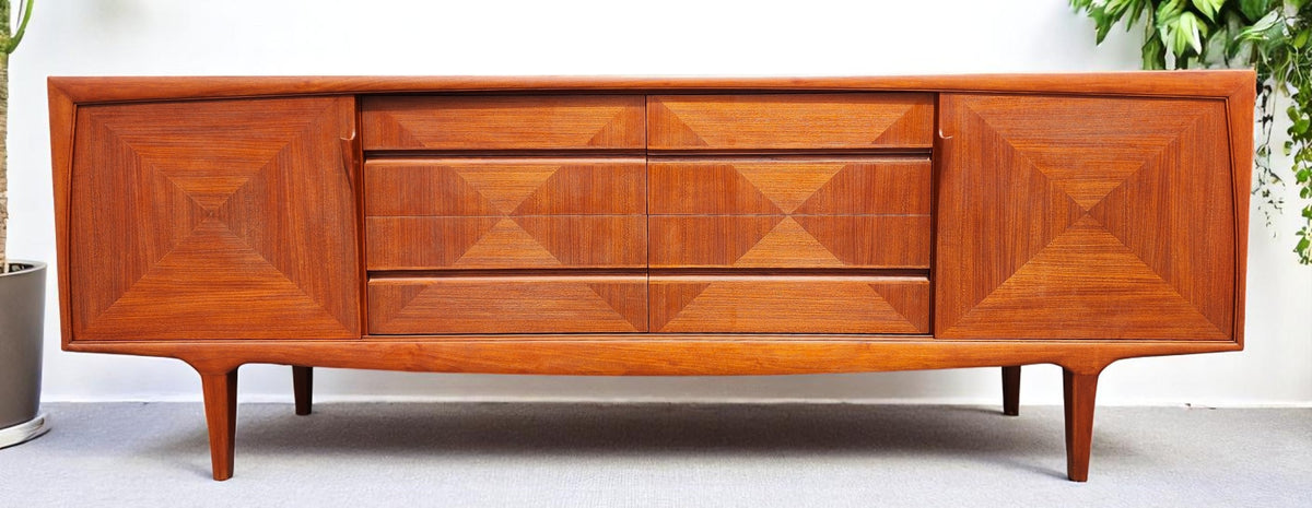Wooden sideboard with geometric design on a white background