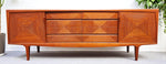 Wooden sideboard with geometric design on a white background 1