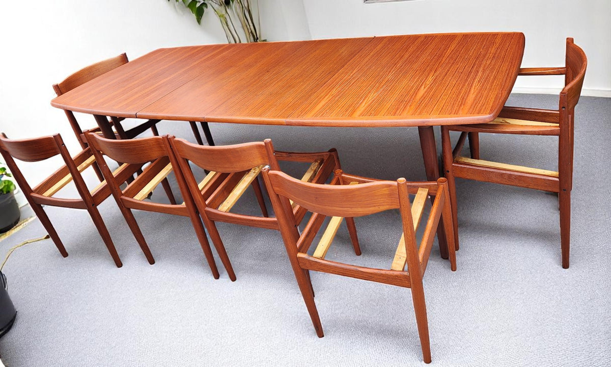 REFINISHED MCM Boat Shaped Teak Table Self storing w 2 Leaves by G. Bahus 63