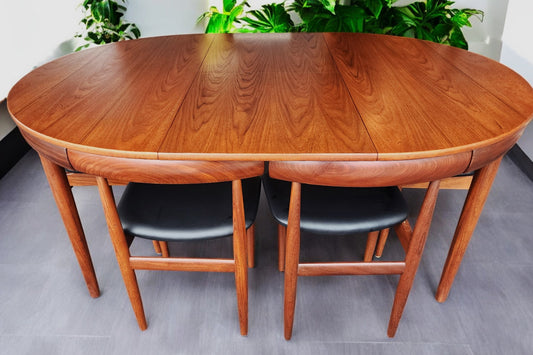 REFINISHED Danish MCM Roundette Teak Extension Table & 6 Chairs (4-legged) by Hans Olsen
