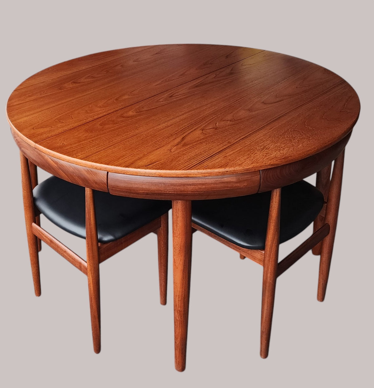 REFINISHED Danish MCM Roundette Teak Extension Table & 6 Chairs (4-legged) by Hans Olsen