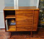 REFINISHED MCM walnut cabinet w sliding doors, narrow, fits records 37.5” 3