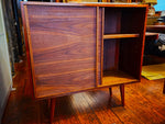 REFINISHED MCM walnut cabinet w sliding doors, narrow, fits records 37.5” 6