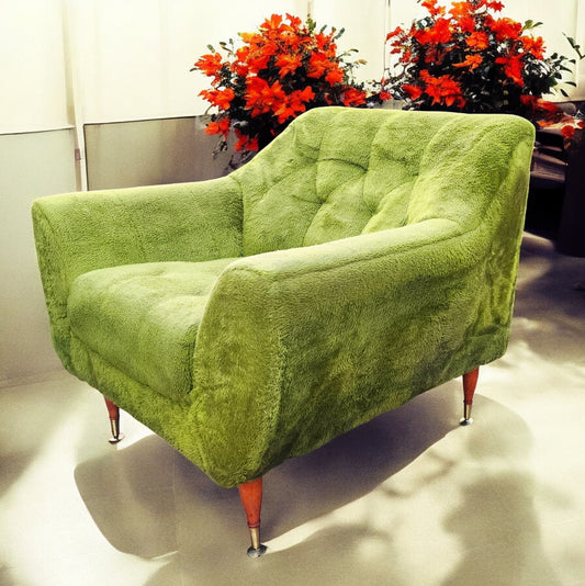 Mid Century Modern armchair with green faux fur upholstery