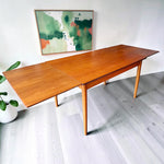 Mid Century Modern Toronto refinished Danish teak and oak extendable dining table with clean wood grain surface 5