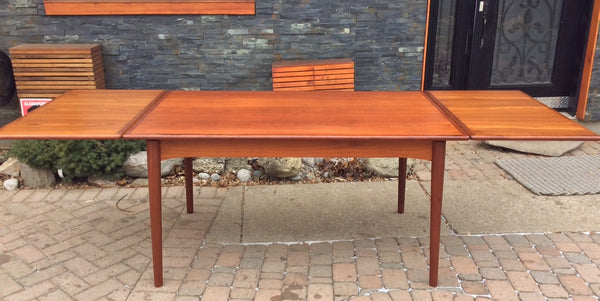 Danish Mid Century Modern Teak Dining Table with 2 hidden leaves - Mid Century Modern Toronto