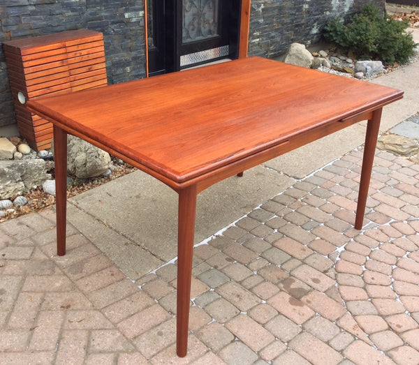 Danish Mid Century Modern Teak Dining Table with 2 hidden leaves - Mid Century Modern Toronto