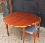 REFINISHED Small Danish MCM  Teak Table Round to Oval w Butterfly Leaf 42