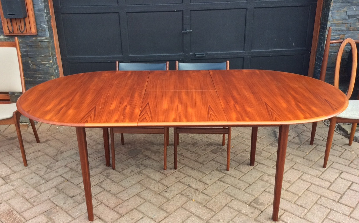 REFINISHED Mid Century Modern Teak Dining Table Oval Extendable Self Storing (with butterfly/ jackknife/ pop up leaf) - Mid Century Modern Toronto