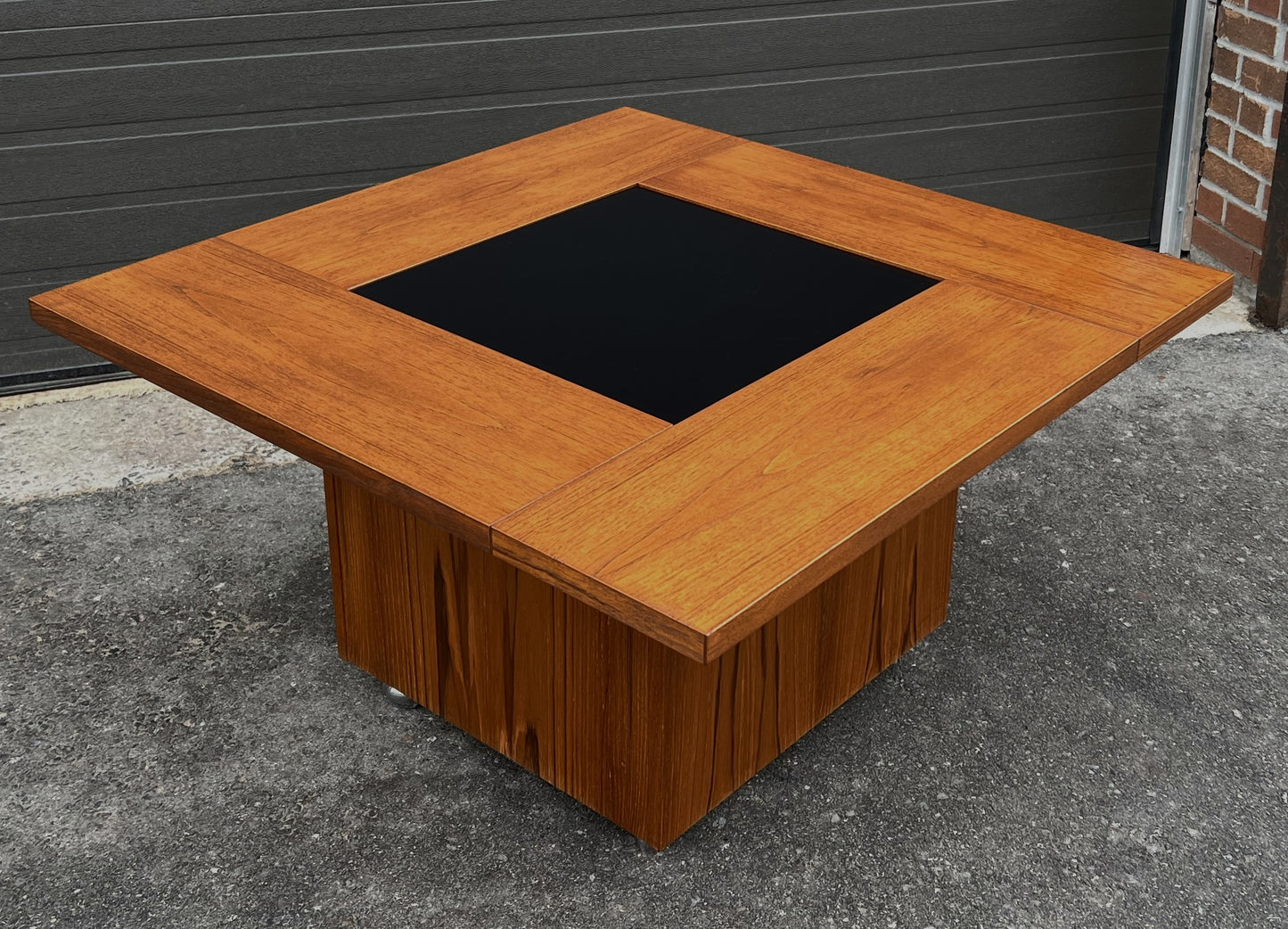 REFINISHED MCM Rolling Teak Coffee Table w Hydraulic Pop-Up Bar by Kai Kristiansen