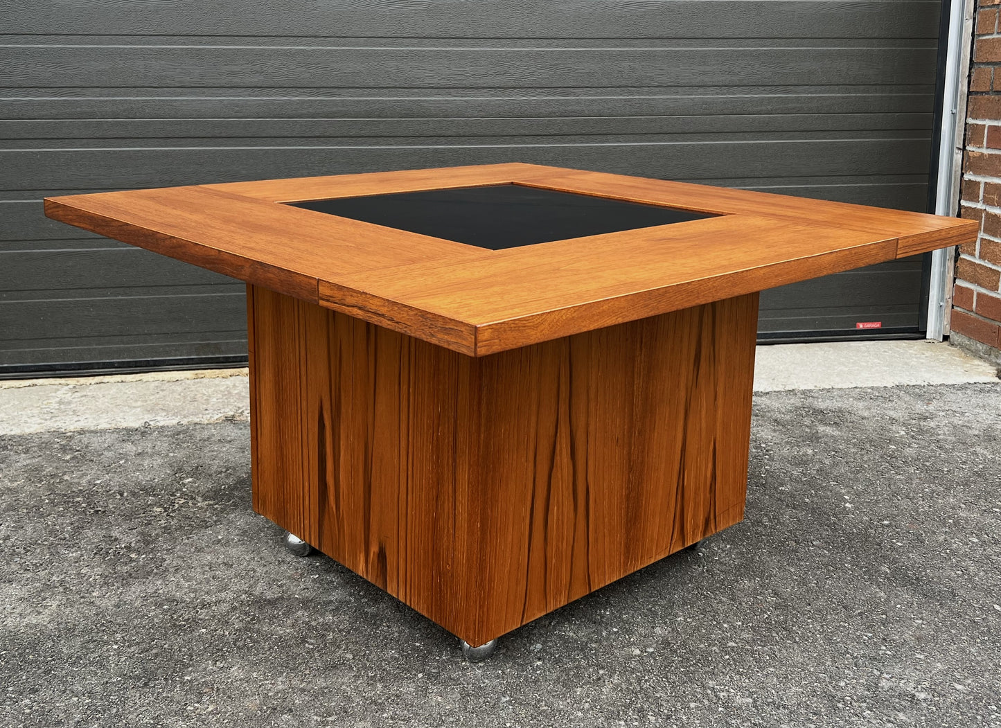 REFINISHED MCM Rolling Teak Coffee Table w Hydraulic Pop-Up Bar by Kai Kristiansen