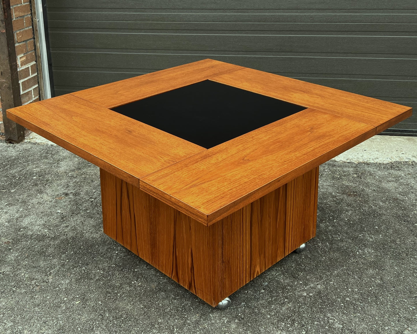 REFINISHED MCM Rolling Teak Coffee Table w Hydraulic Pop-Up Bar by Kai Kristiansen