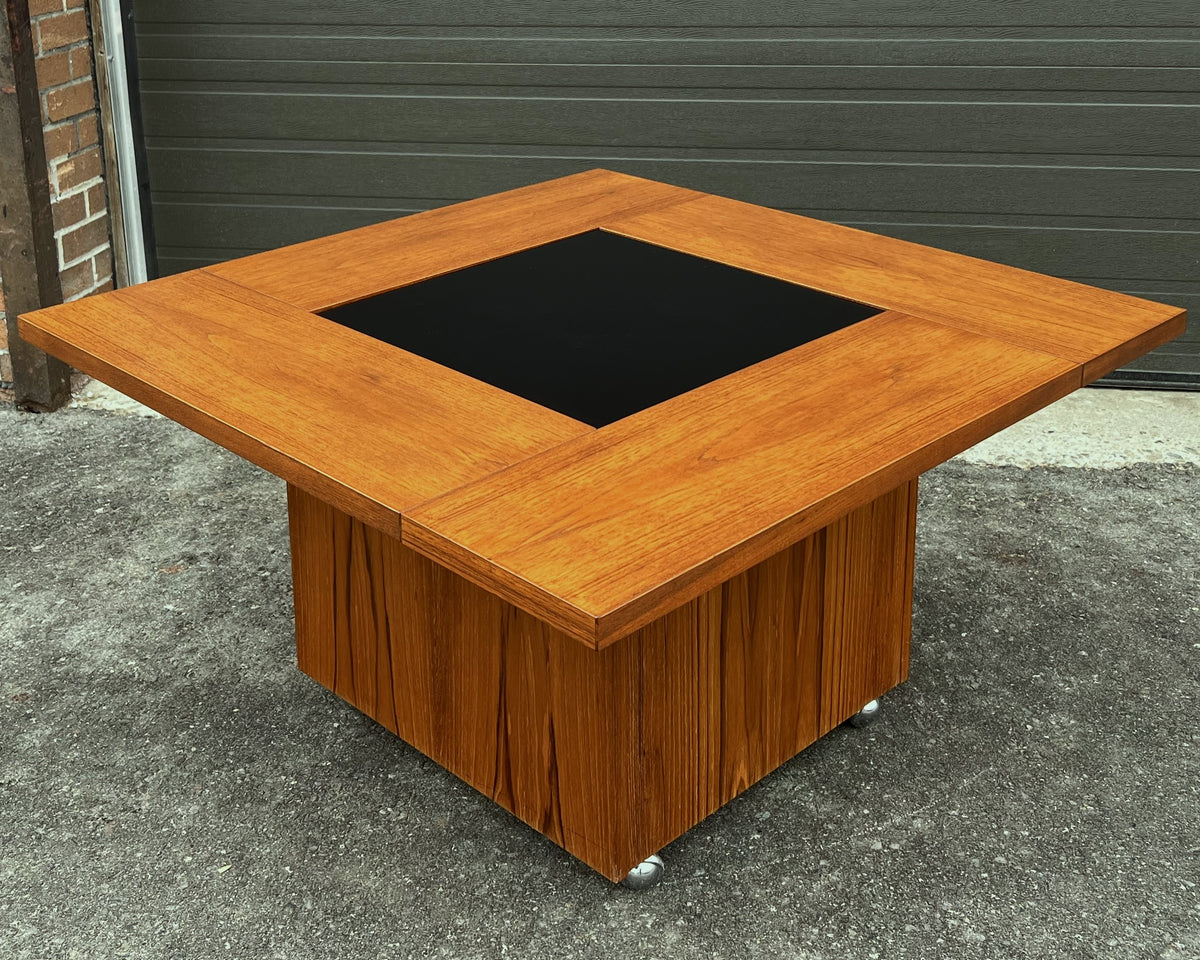 REFINISHED MCM Rolling Teak Coffee Table w Hydraulic Pop-Up Bar by Kai Kristiansen