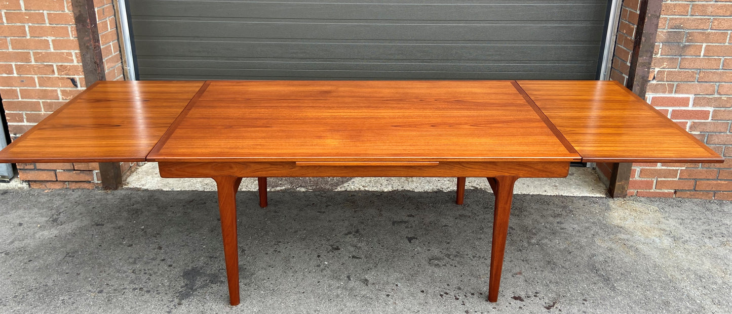 REFINISHED large Danish Mid Century Modern teak table by J. Andersen 65-108"