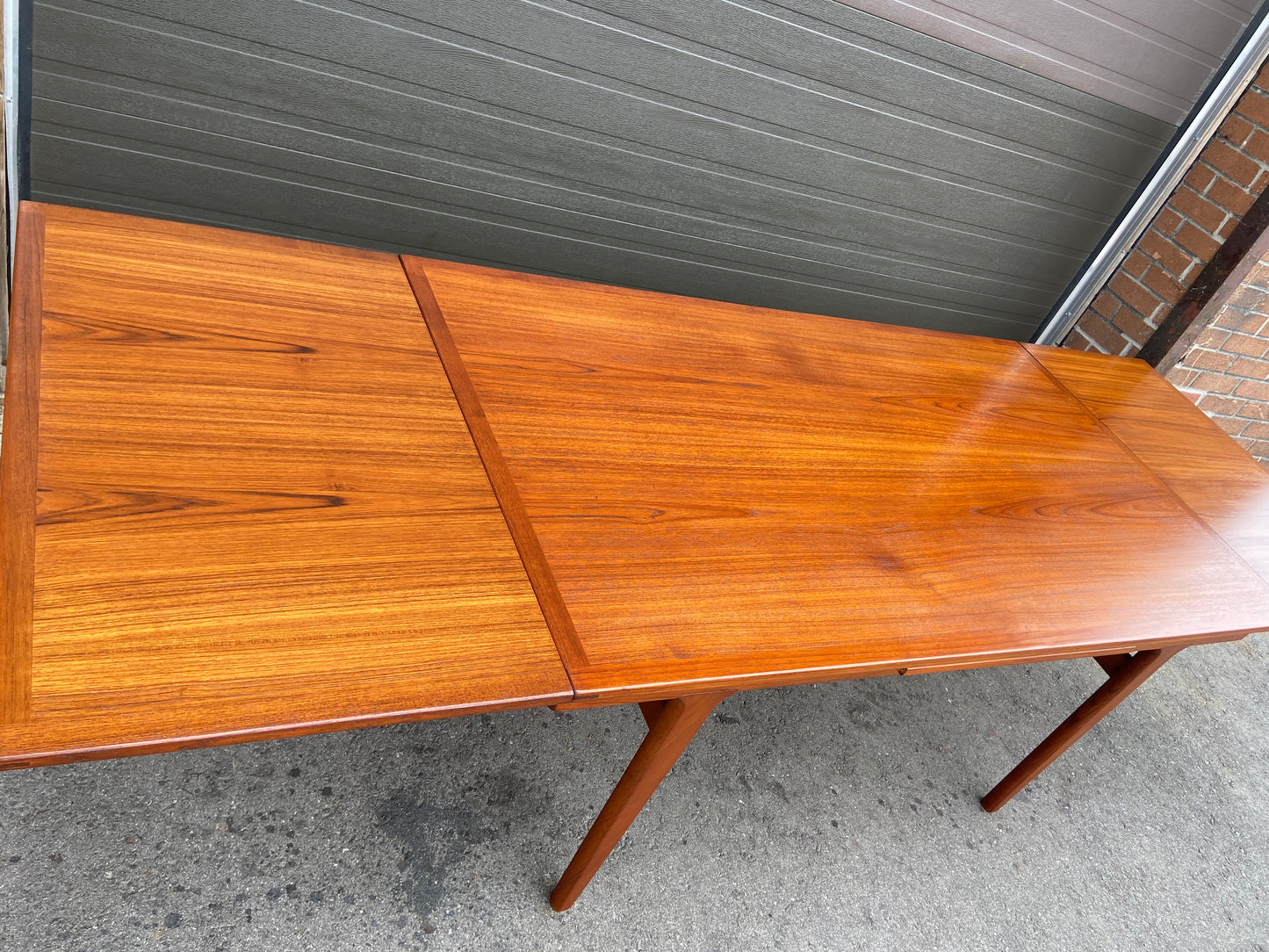 REFINISHED large Danish Mid Century Modern teak table by J. Andersen 65-108"