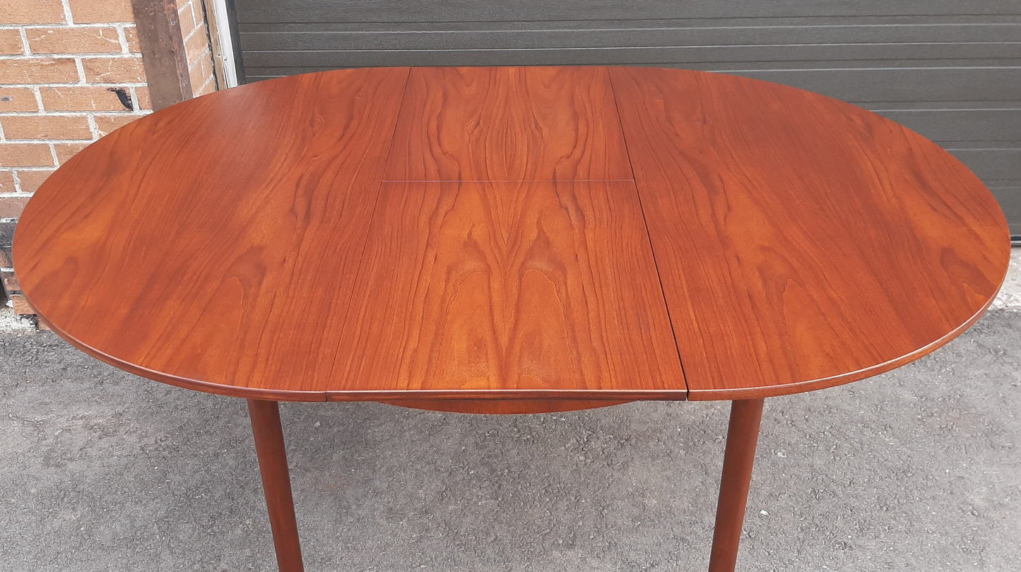 REFINISHED MCM Teak Table Round to Oval w Butterfly Leaf by McIntosh 48"-66"
