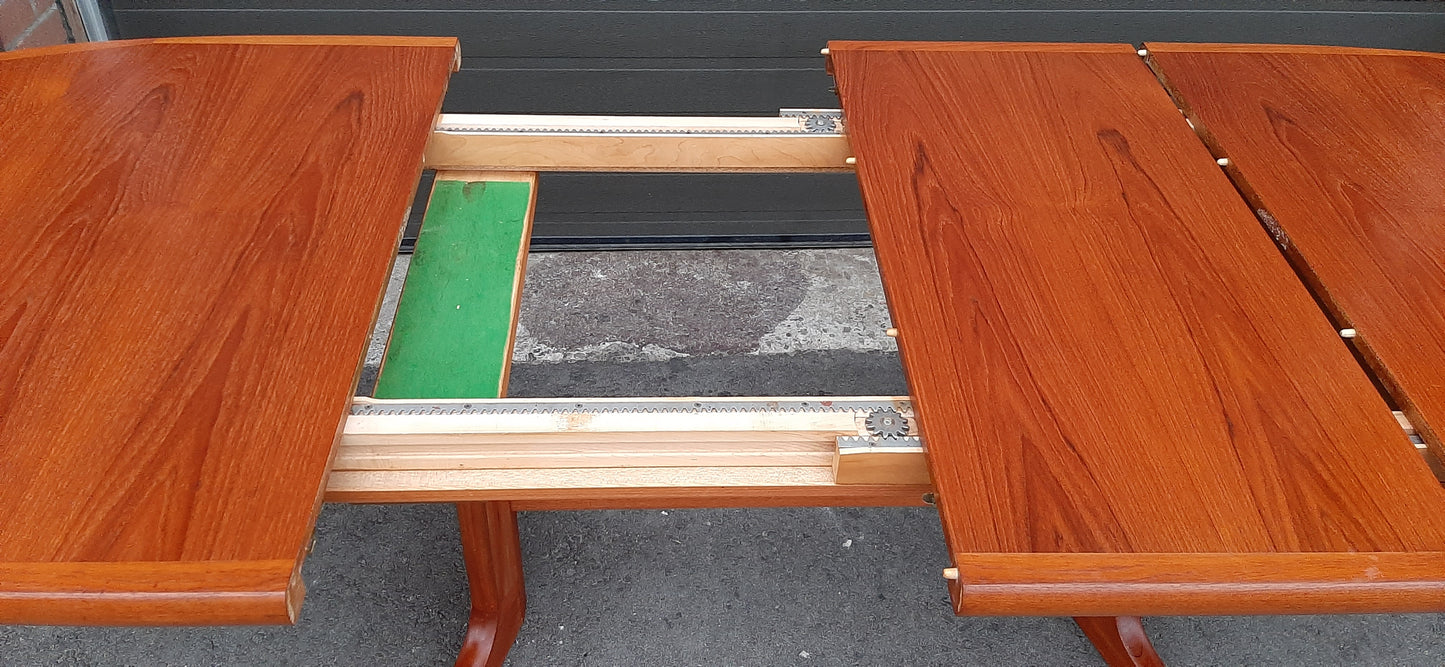 REFINISHED MCM Teak Dining Table w 2 Leaves Selfstoring, 63"-100.5"