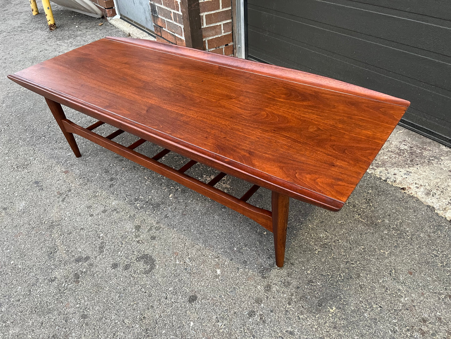 REFINISHED Mid Century Modern walnut coffee table w slatted shelf, 54"