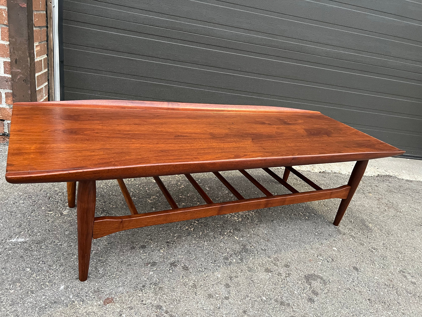 REFINISHED Mid Century Modern walnut coffee table w slatted shelf, 54"